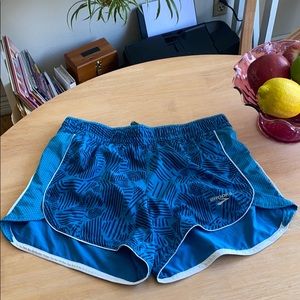 Brooks running shorts.
